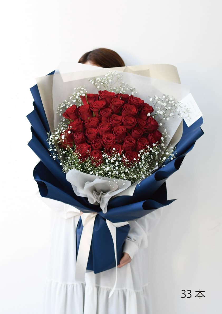 ハリーウィストンのブランドカラーをイメージしたバラの花束